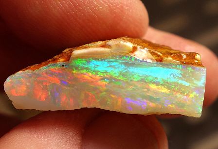 Multicolor rough crystal opal from Coober Pedy, South Australia